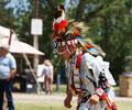 young boy Wind River Indian dancer doing the Men's Grass Dance