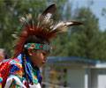 young boy Wind River Indian dancer doing the Men's Grass Dance