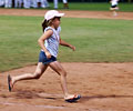 Fort Collins Foxes fan running the bases
