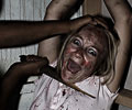 beautiful girl tortured at Morbid Nights Haunted House